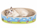 Ragdoll cat lying in an oval cardboard cat scratcher bed